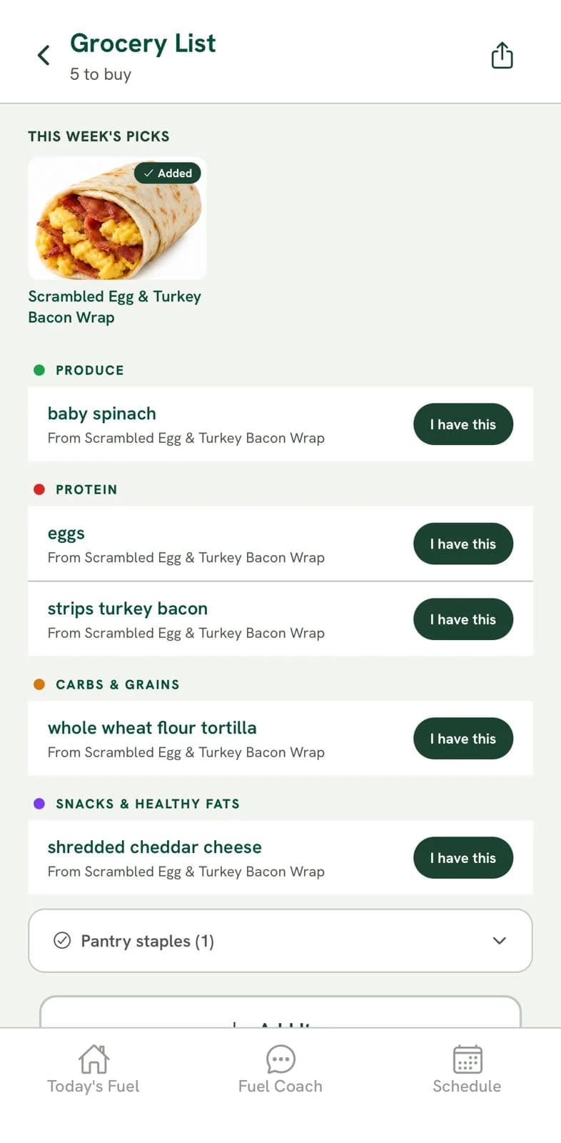 The grocery list it produced, grouped into produce, protein, carbs and grains, each item labelled with the recipe it came from